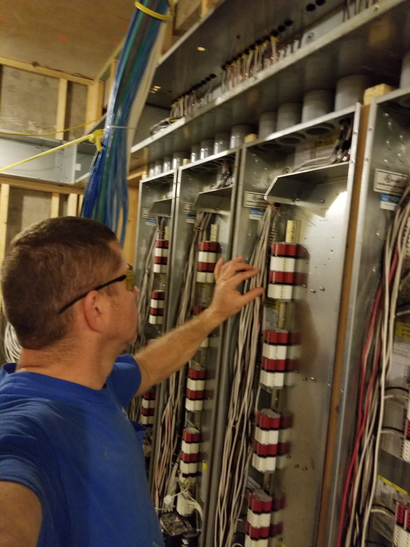 MG Electrical electrician working on panel